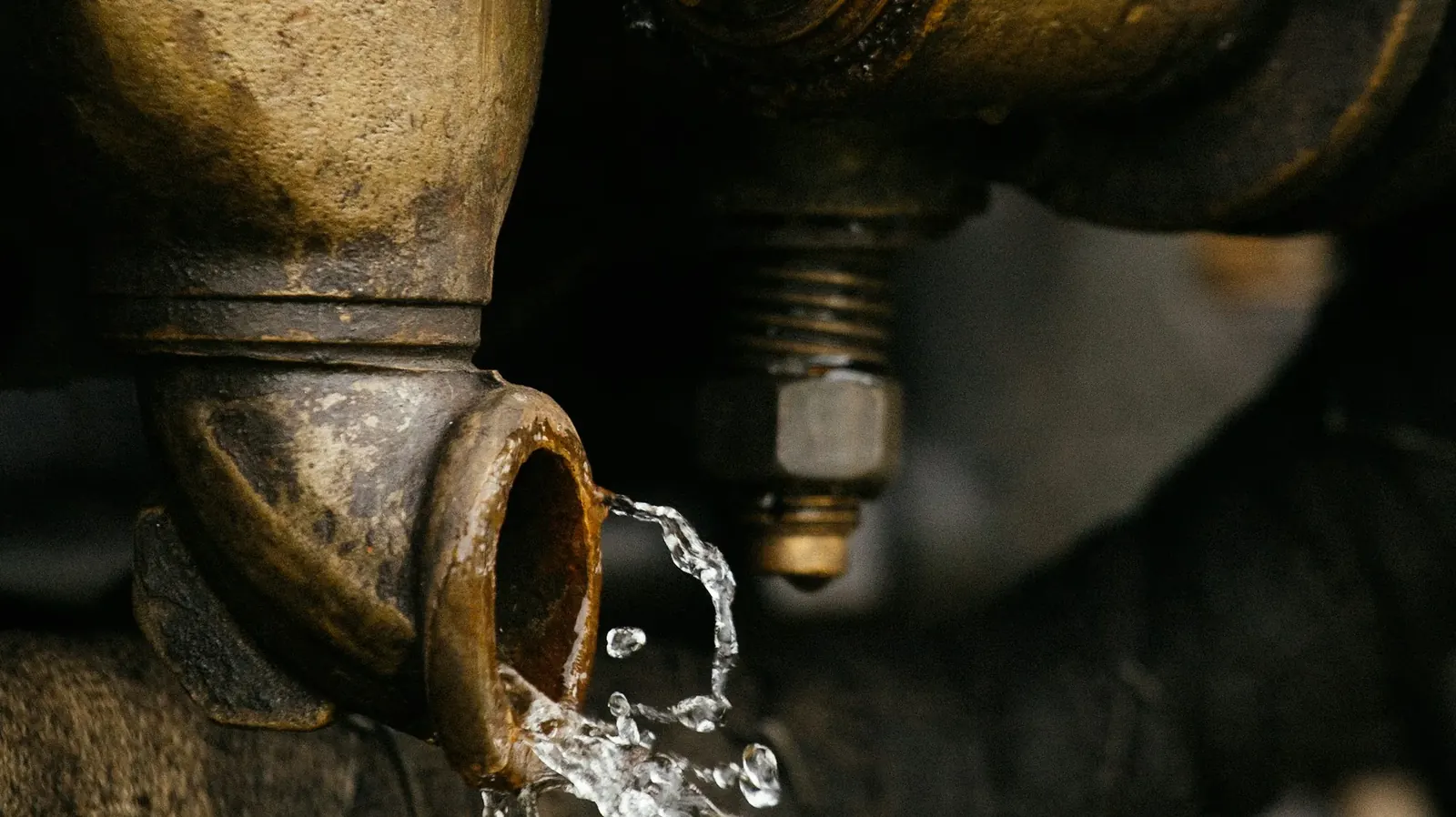 Water spraying from an old brass valve